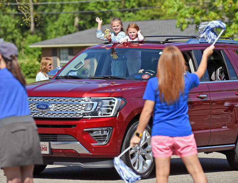 Teachers hold parade for students at Houston Academy